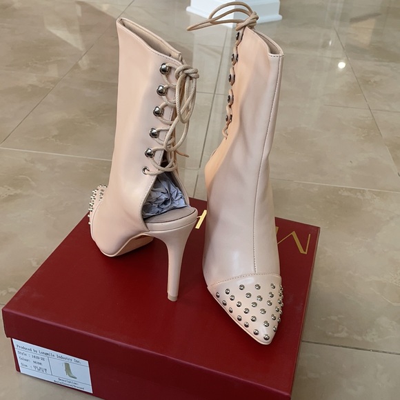 Brand new in box lace up booties. Size 7 7.5 and 9 - Picture 6 of 6